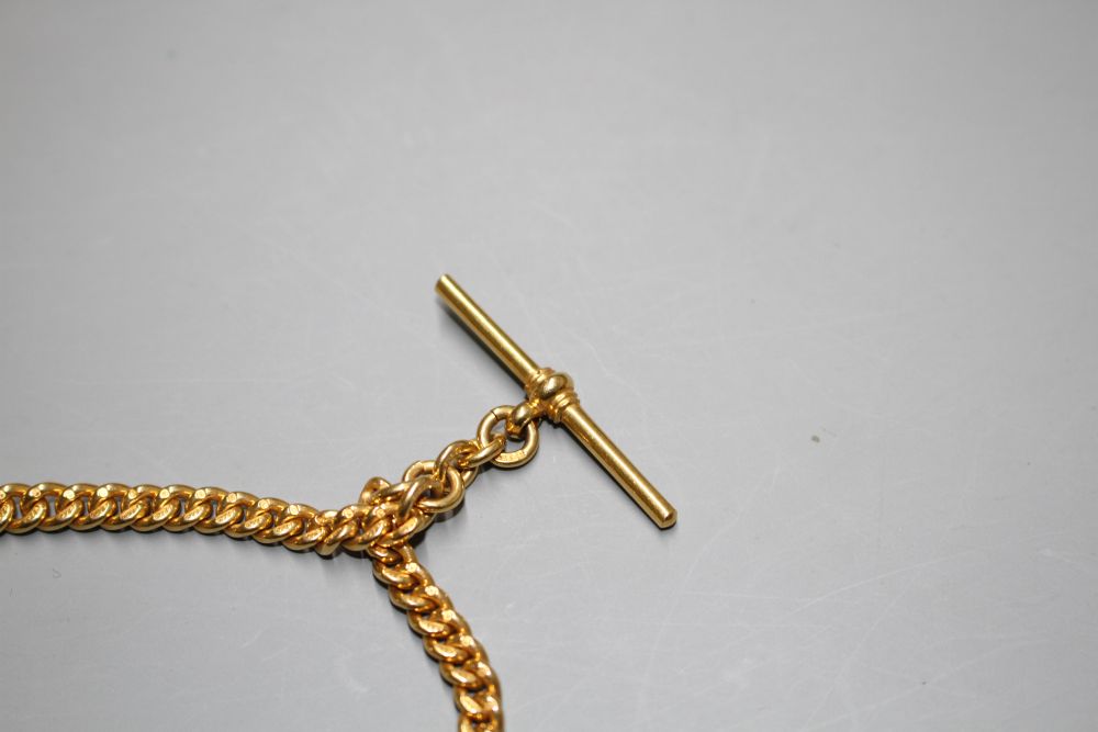 An early 20th century 9ct gold graduated curb link albert, by William Harrison Walter,